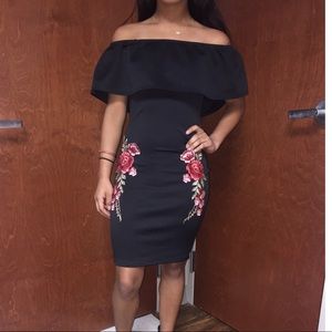 Black off the shoulder dress with floral touch